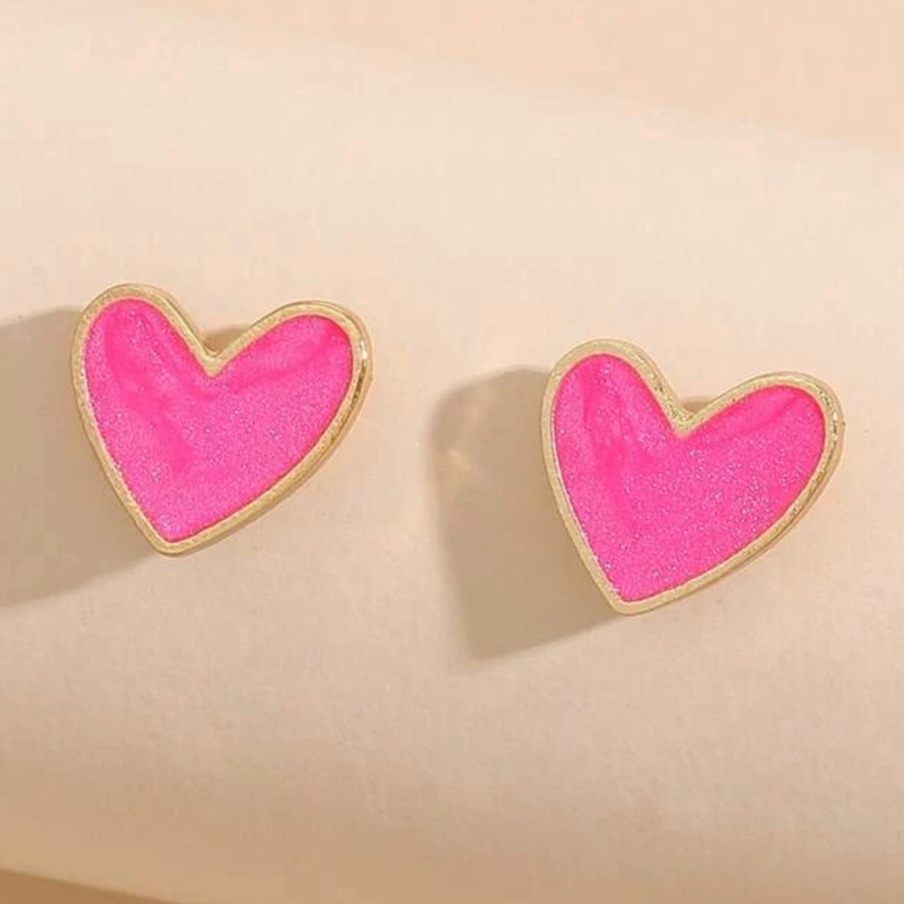 Pink fashion heart earrings.